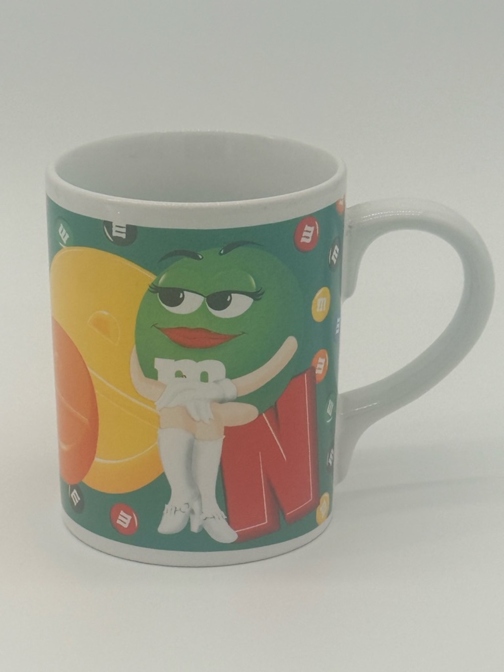 M&M'S Green Character Ceramic Mug with Yellow and Red Accents